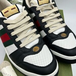 Gucci Men's low top screener sneakers . Paneled leather design . Size 12.5